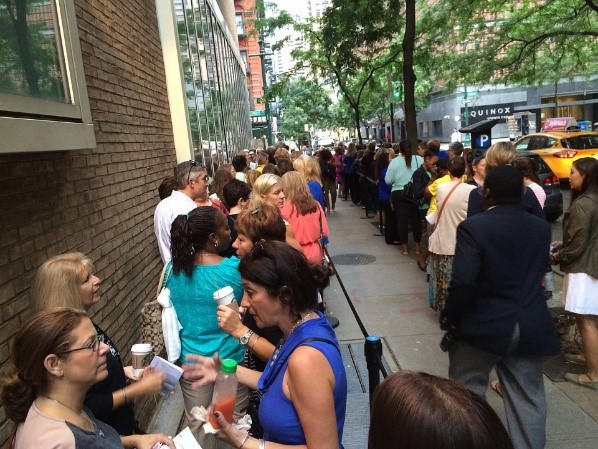 image of people standing in a line